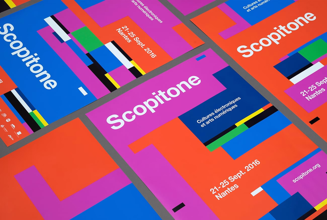 Brightly colored posters featuring geometric shapes, text, and event details for Scopitone in Nantes.