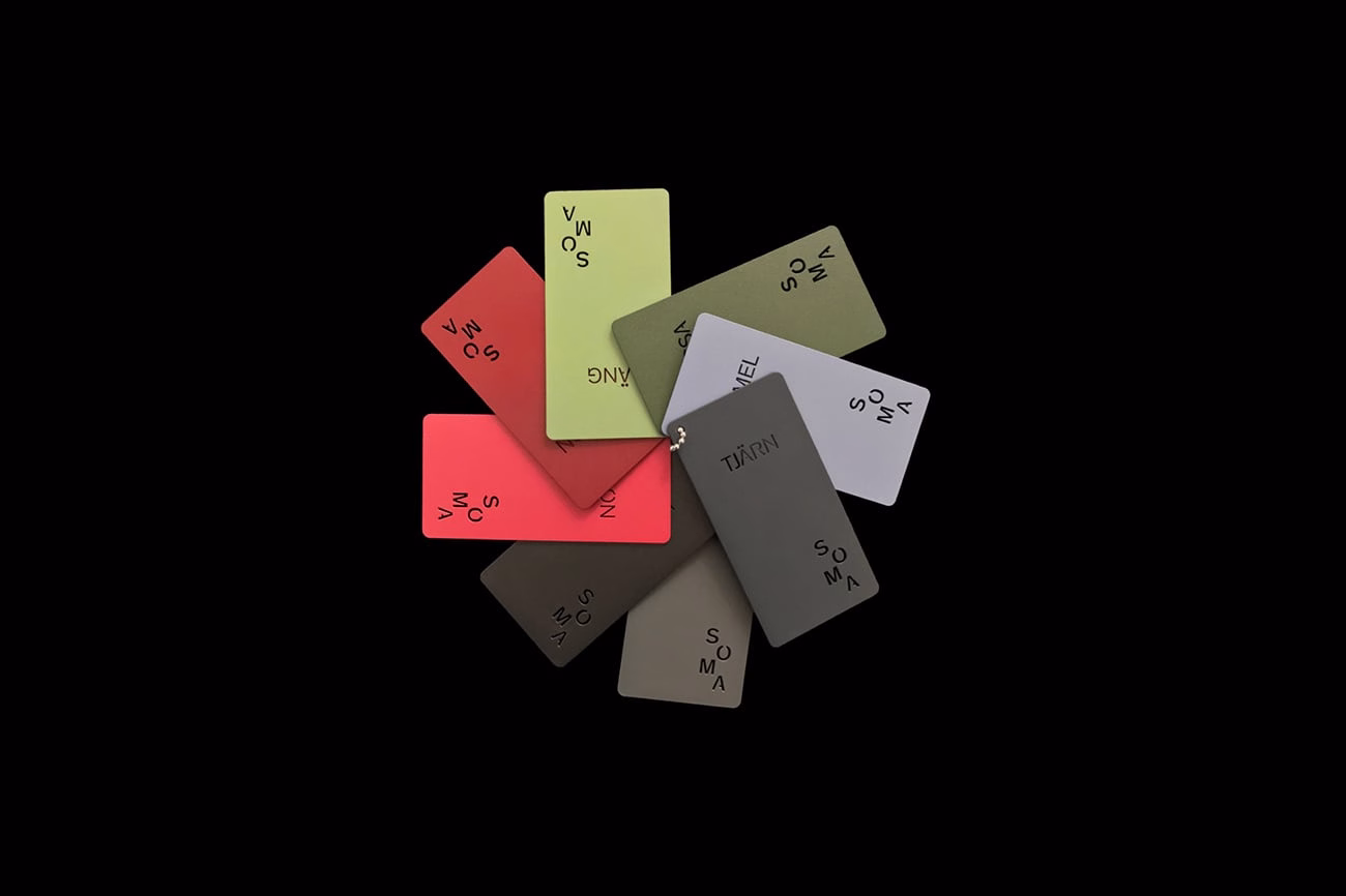 A collection of colorful card swatches displayed on a black background, with each card labeled in bold typography.