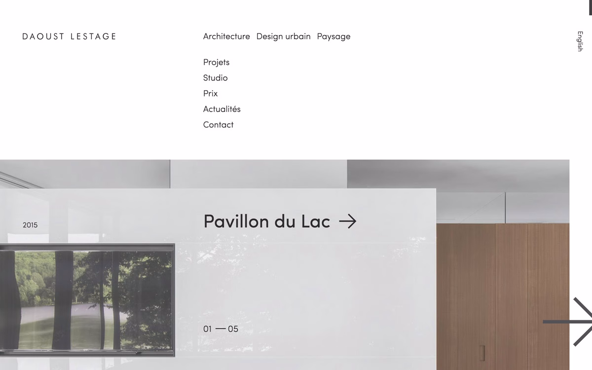 A sleek, minimalistic webpage features a large image frame, displaying tranquil lakeside greenery with a white background.