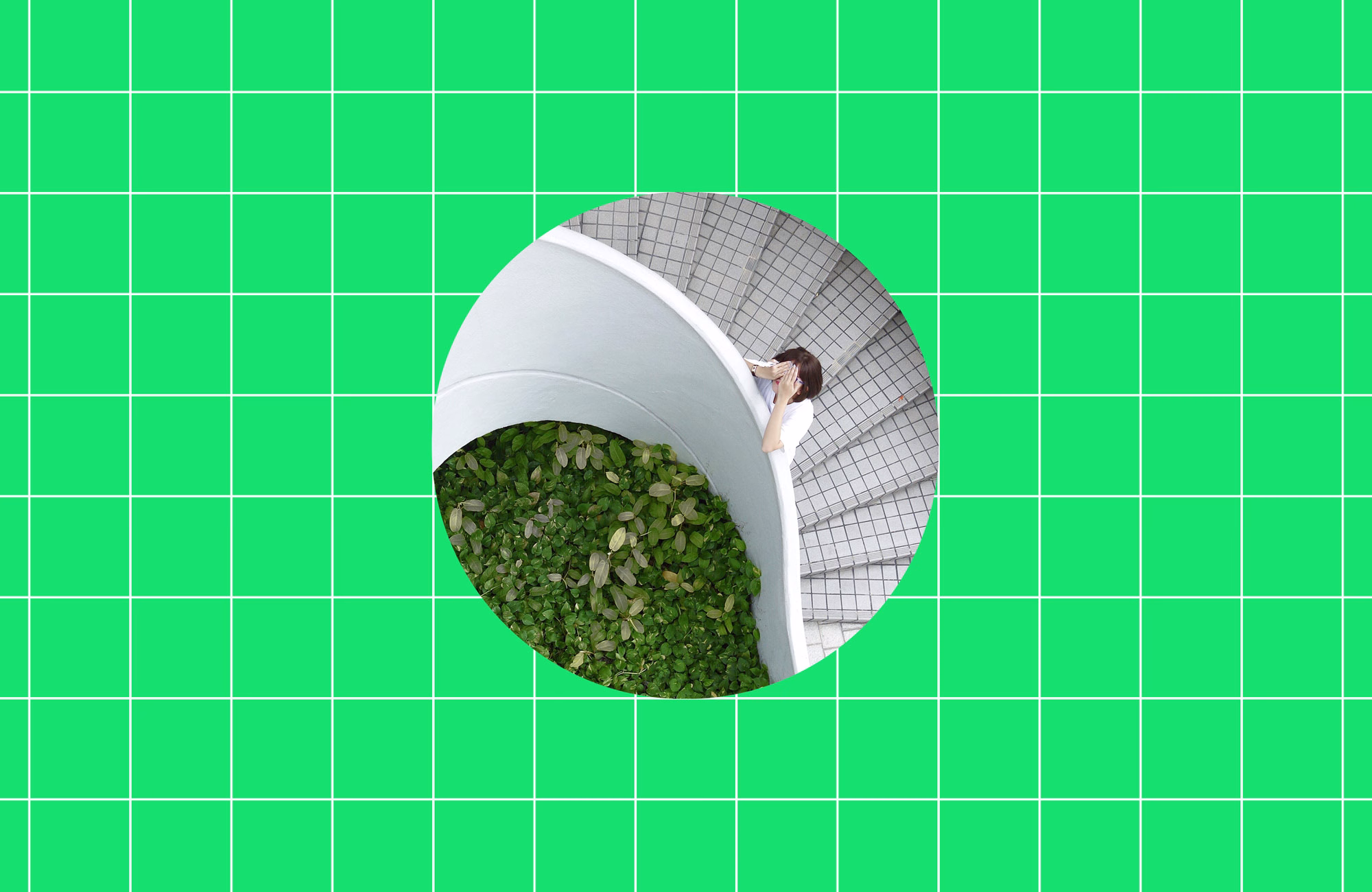 A woman in a white dress stands near a circular staircase surrounded by lush green foliage. The background is bright green.
