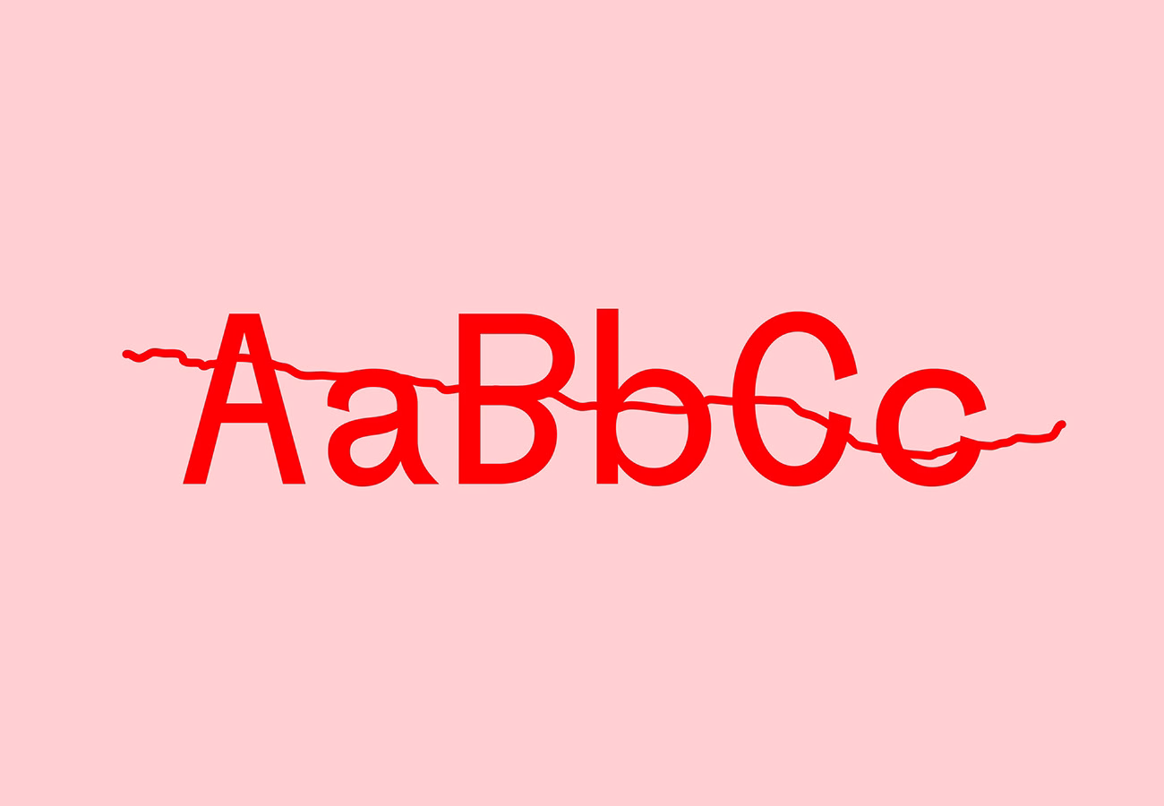 Red letters "AaBbCc" are crossed out on a soft pink background, creating a bold contrast.