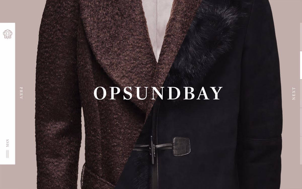 A close-up of a jacket combining textured brown fabric and smooth black leather, featuring a dual-tone design.