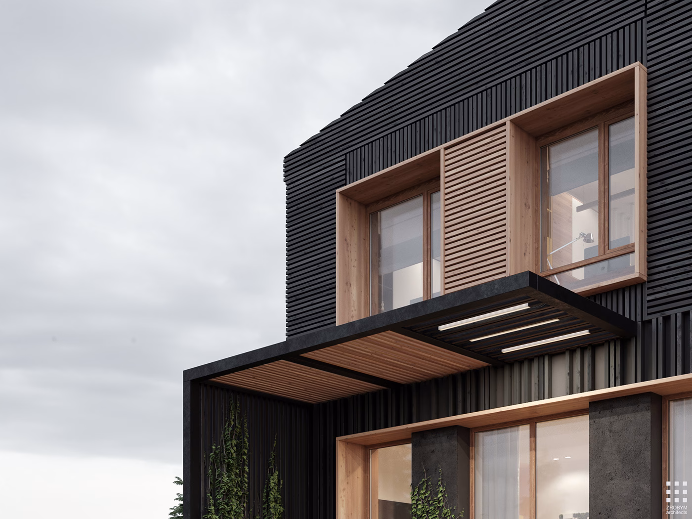 A modern building features a blend of black vertical slats and wooden accents around large windows, set against a cloudy sky.