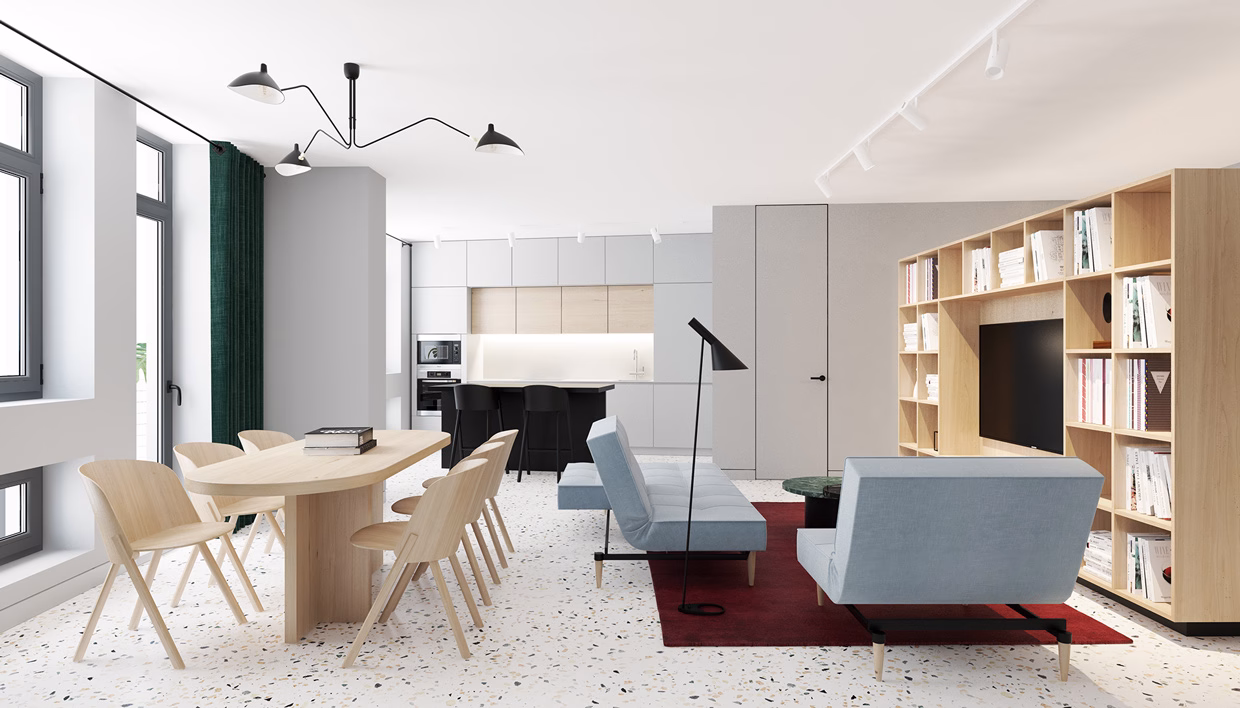 A modern living space features a light blue sofa, wooden dining table, and shelves filled with books against a terrazzo floor.
