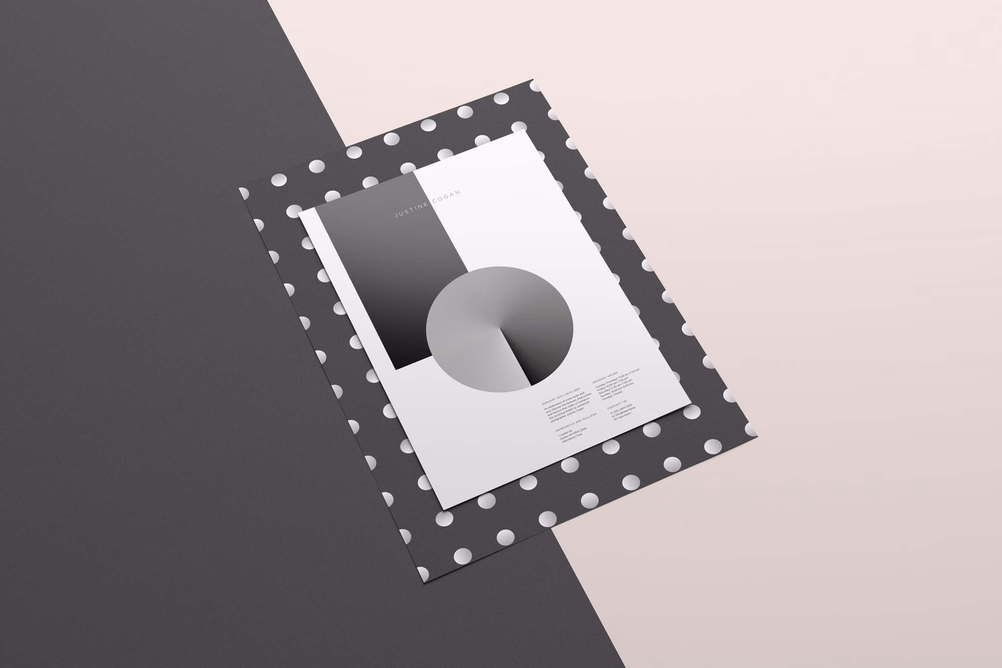 A white brochure with geometric shapes rests on polka-dot patterned paper, set against a soft pink background.