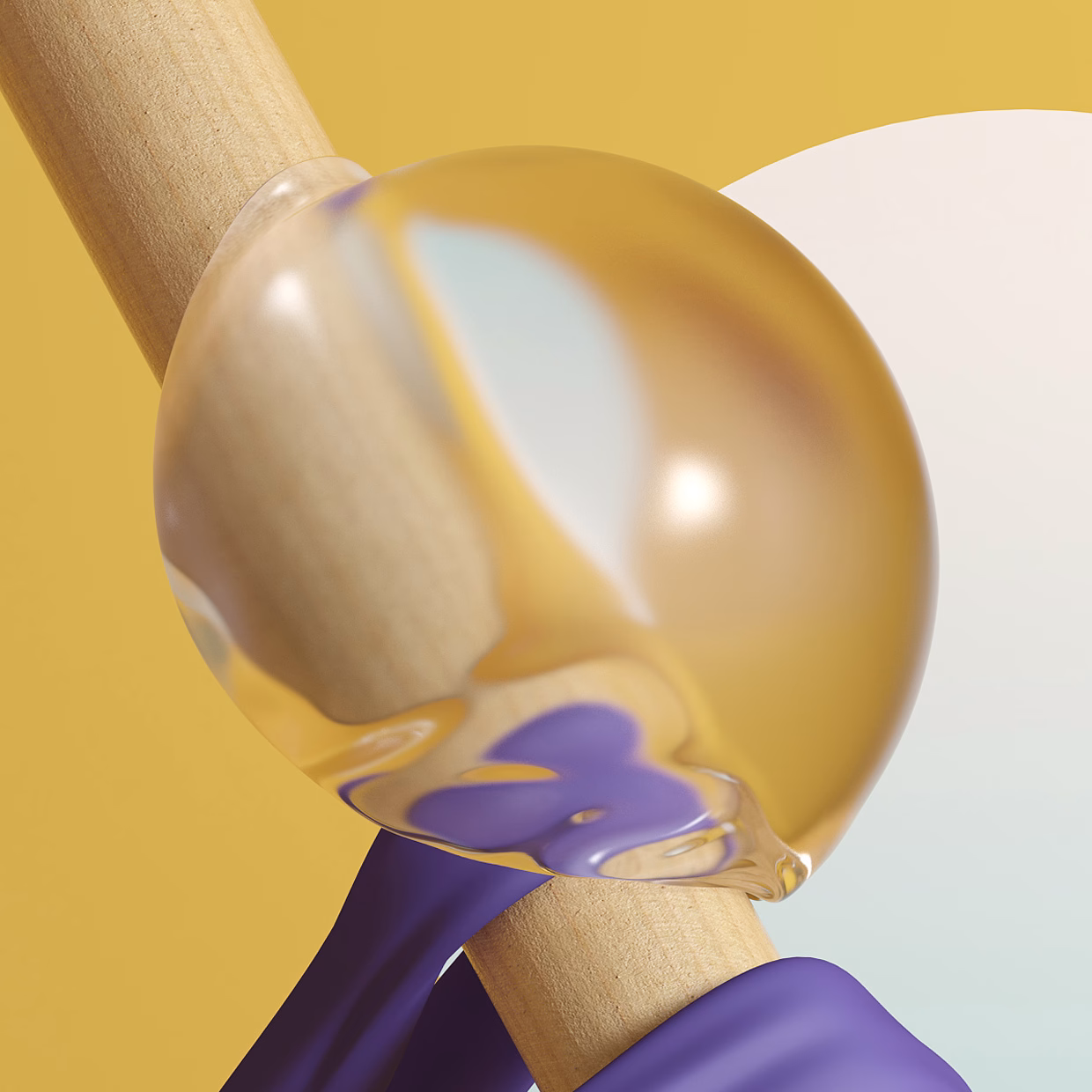 A glossy, amber orb rests on a wooden stick, accented by a smooth, purple wrap against a warm yellow background.