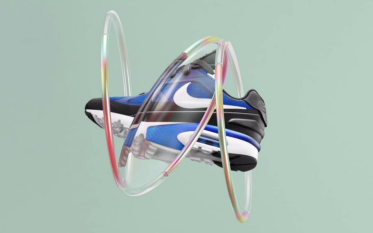 A blue sneaker is suspended in the air, encircled by a transparent, rainbow-hued ring against a pale green background.