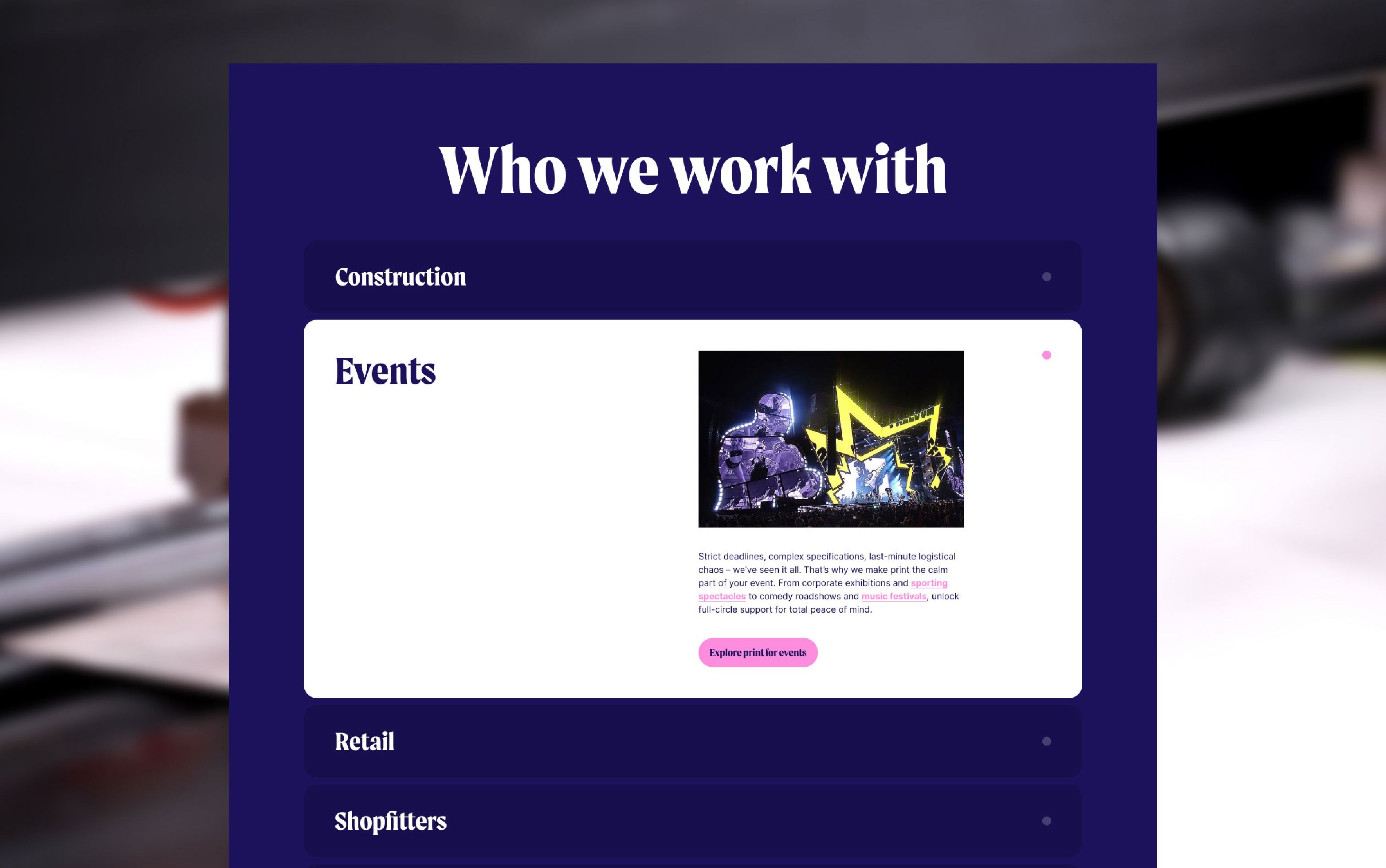 Website section titled "Who we work with" featuring events with a vibrant stage image.