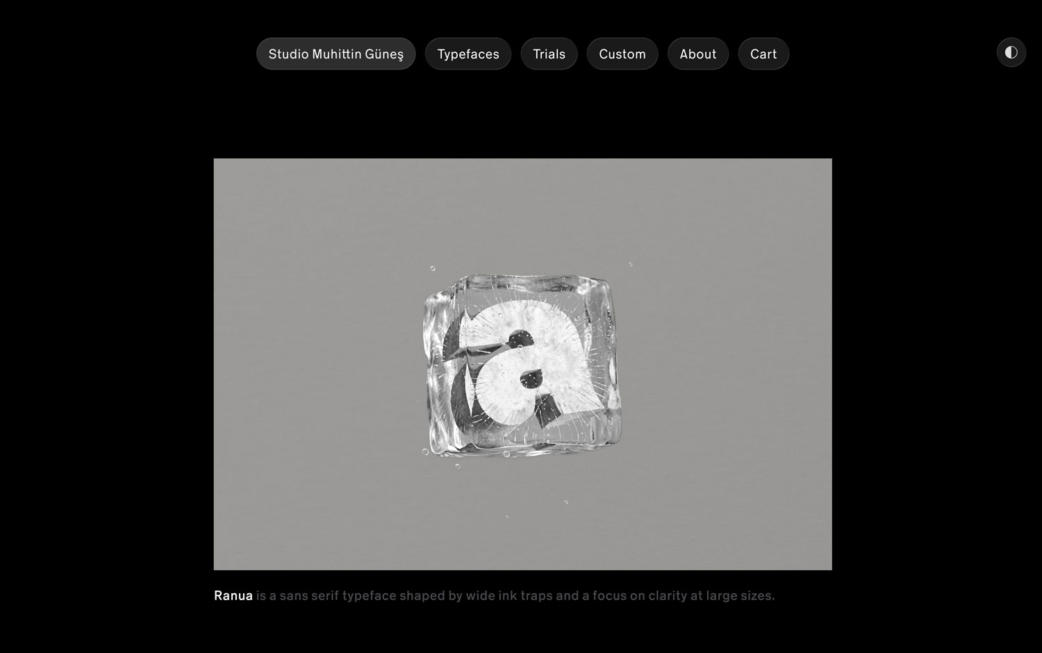 A lowercase "a" typeface in a melting ice cube on a gray background.