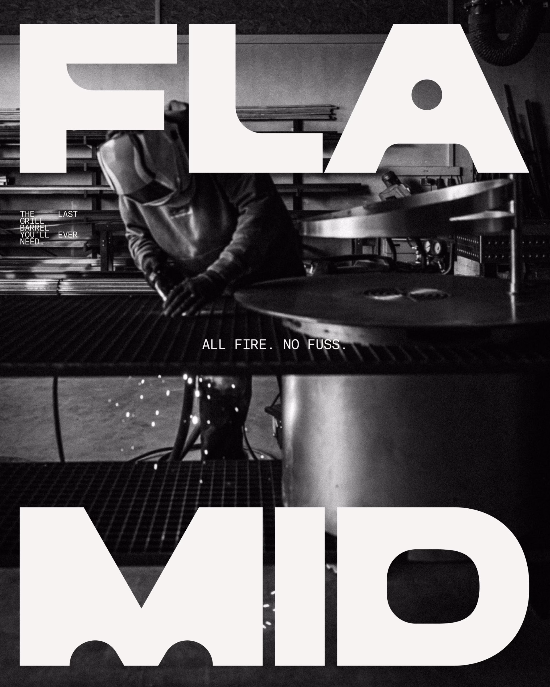 A welder at work, with the bold white "FLAMID" logo prominently displayed above in a black and white setting.