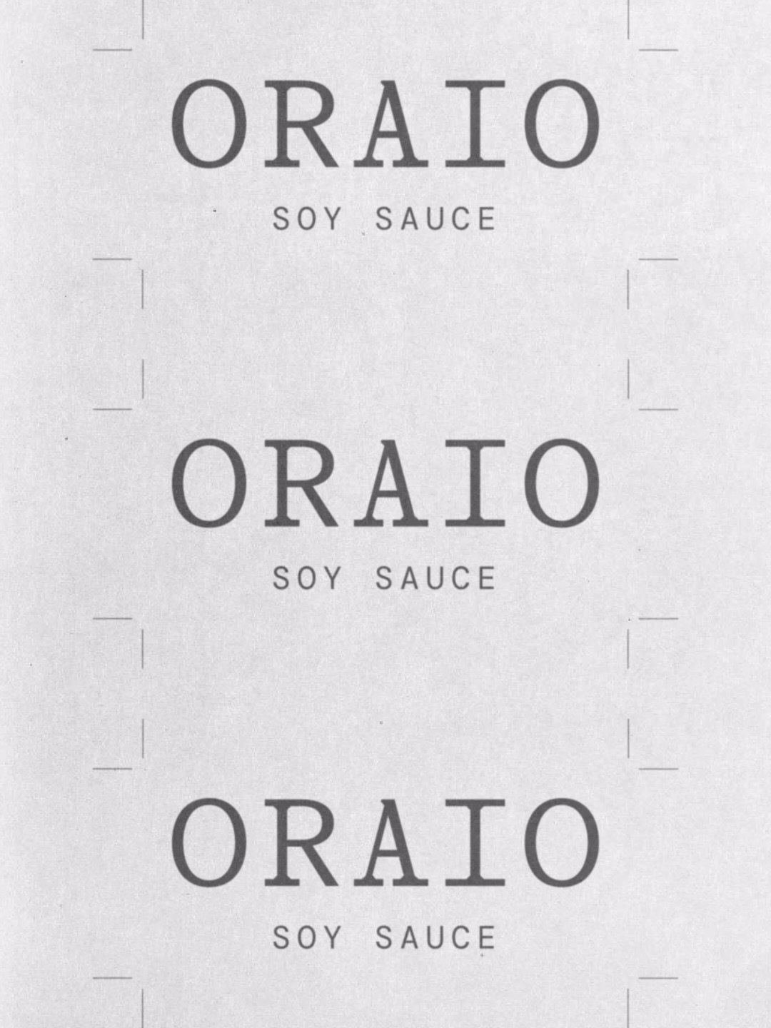 Minimalist packaging design for Oraio soy sauce featuring bold typography in black on a light background.