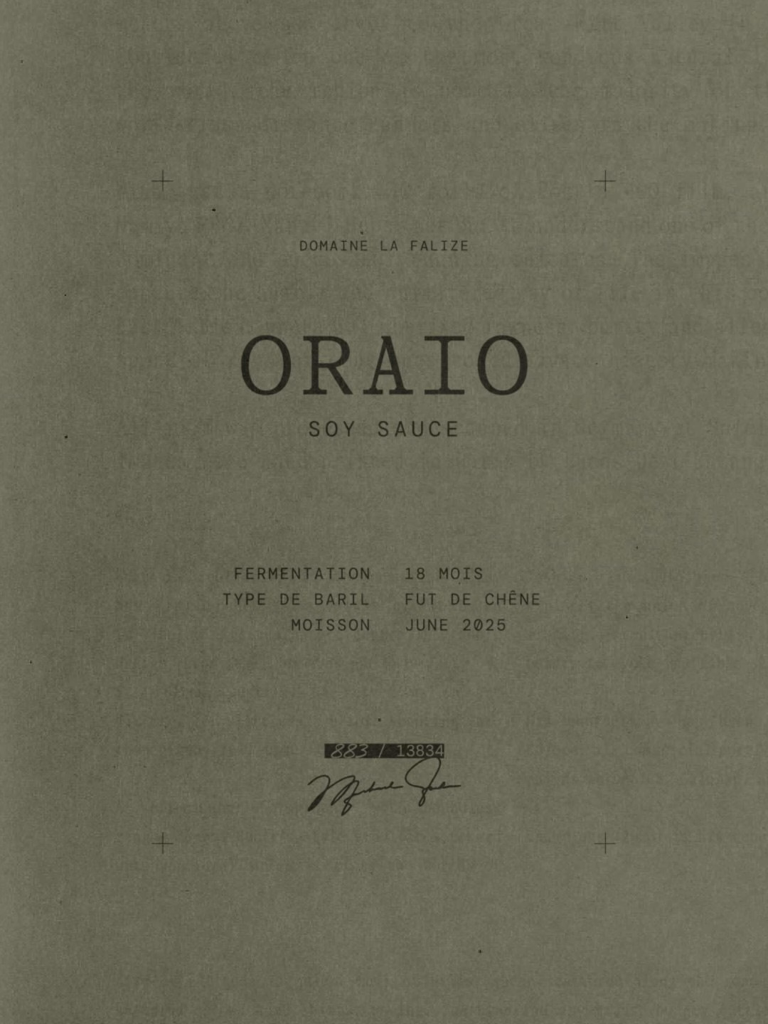 Oraio soy sauce label in dark green with stylized typography and details about fermentation and barrel type.