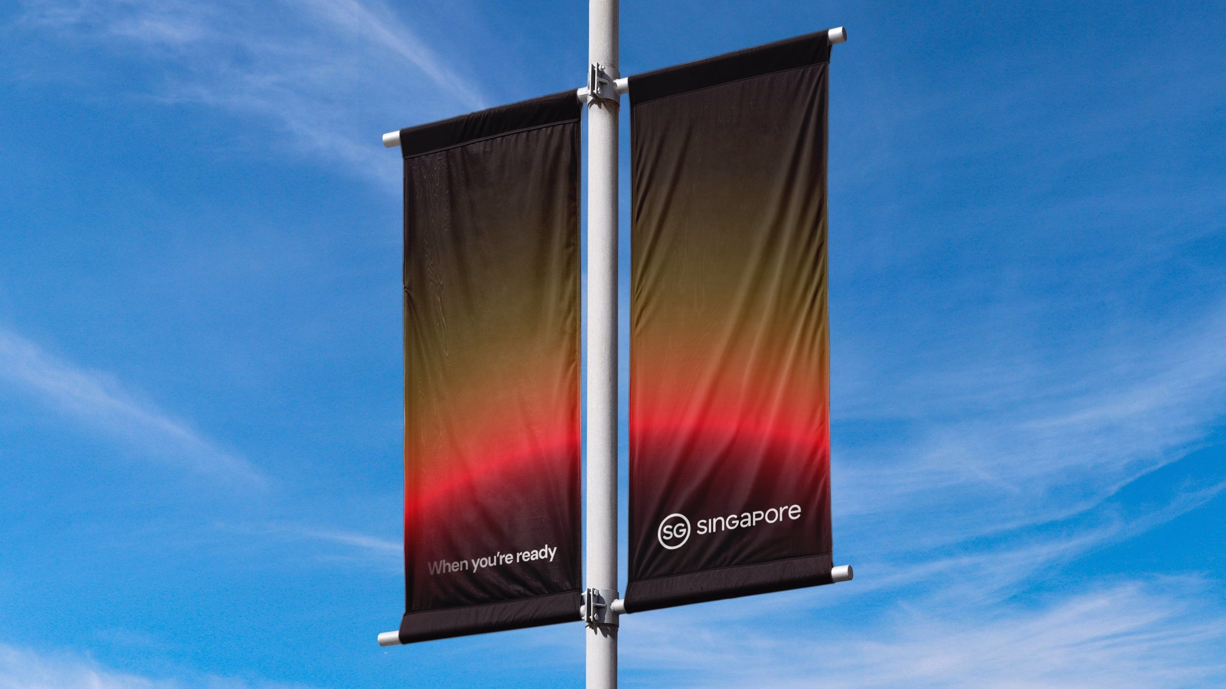Banners featuring a gradient of black, orange, and red with the text "When you're ready" and "SG Singapore" displayed.