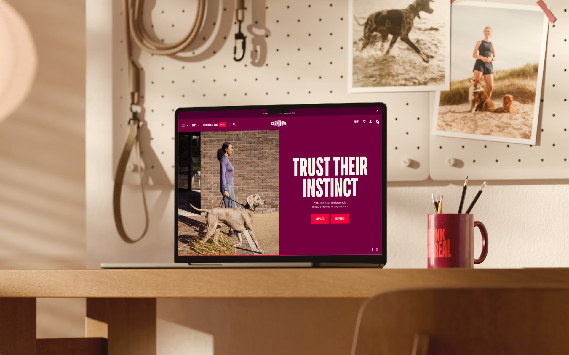 Carnilove's website displays bold typography in a burgundy palette, promoting pet food alongside lifestyle imagery.