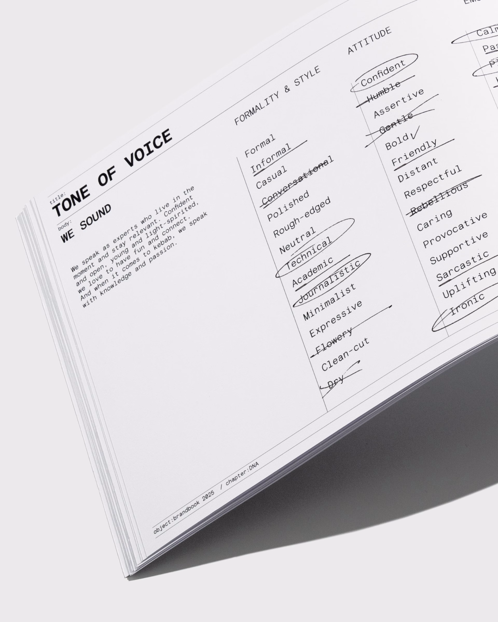 Brand book page featuring written elements on tone of voice, with a minimalist black and white design and clean typography.