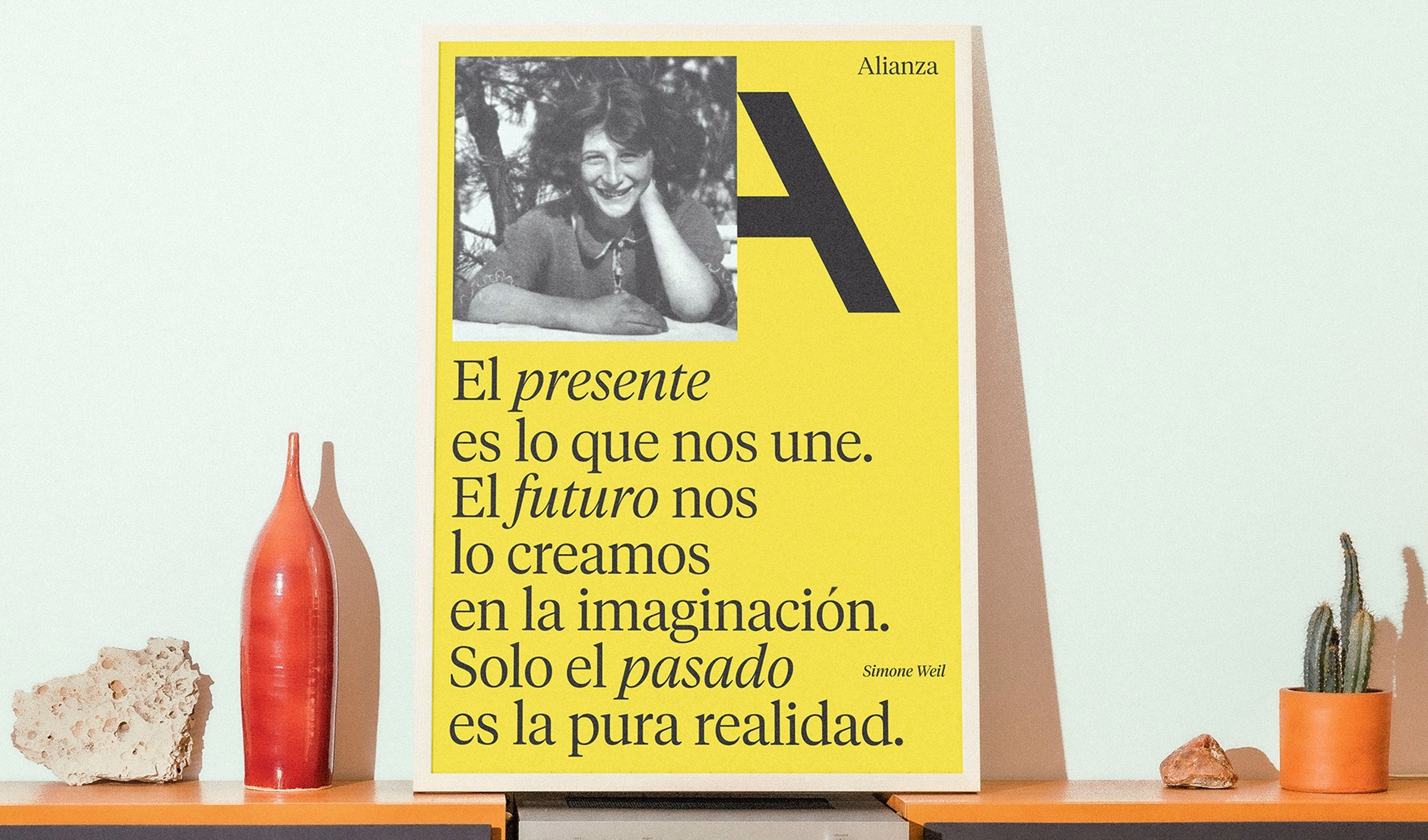 A vibrant yellow poster features the word "Alianza" and a portrait, with bold typography and a graphic letter 'A'.