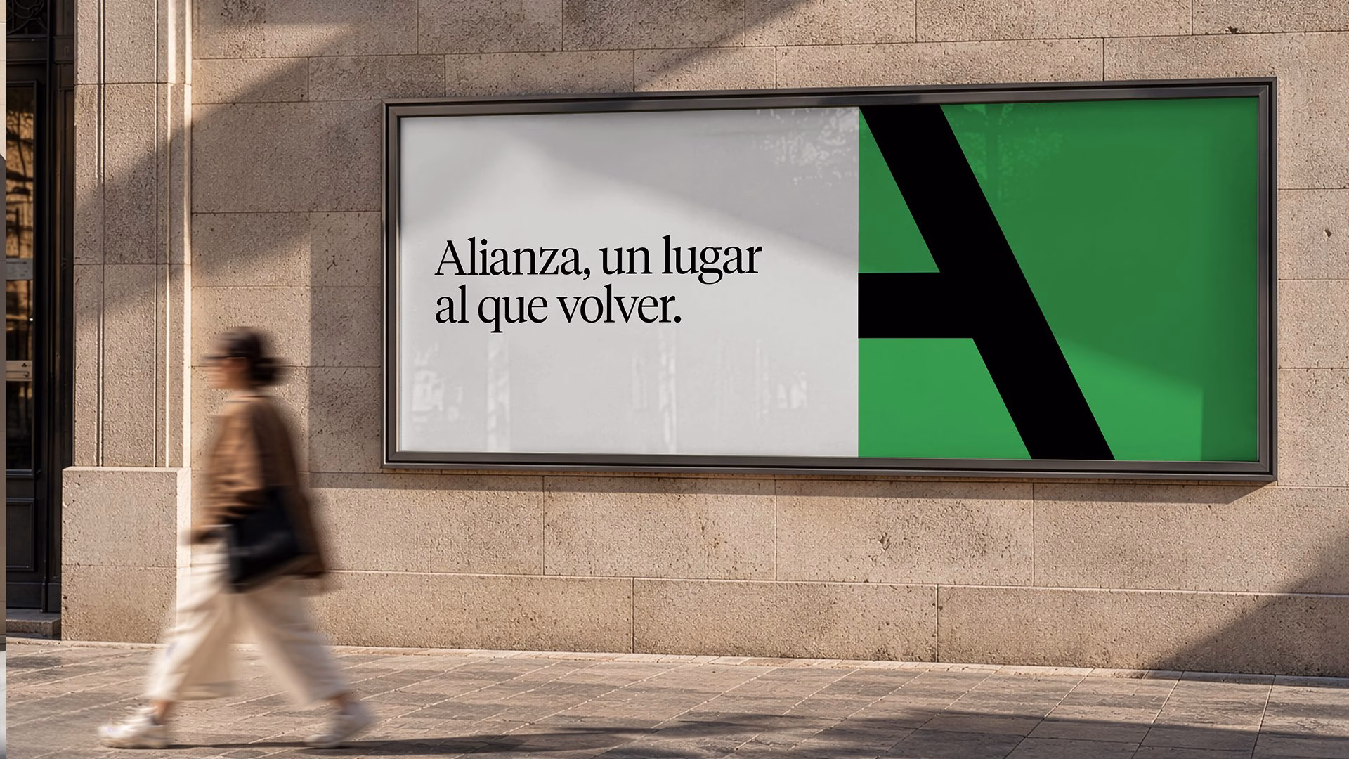 A billboard displaying "Alianza" in bold typography with a green background and a large stylized black letter 'A'