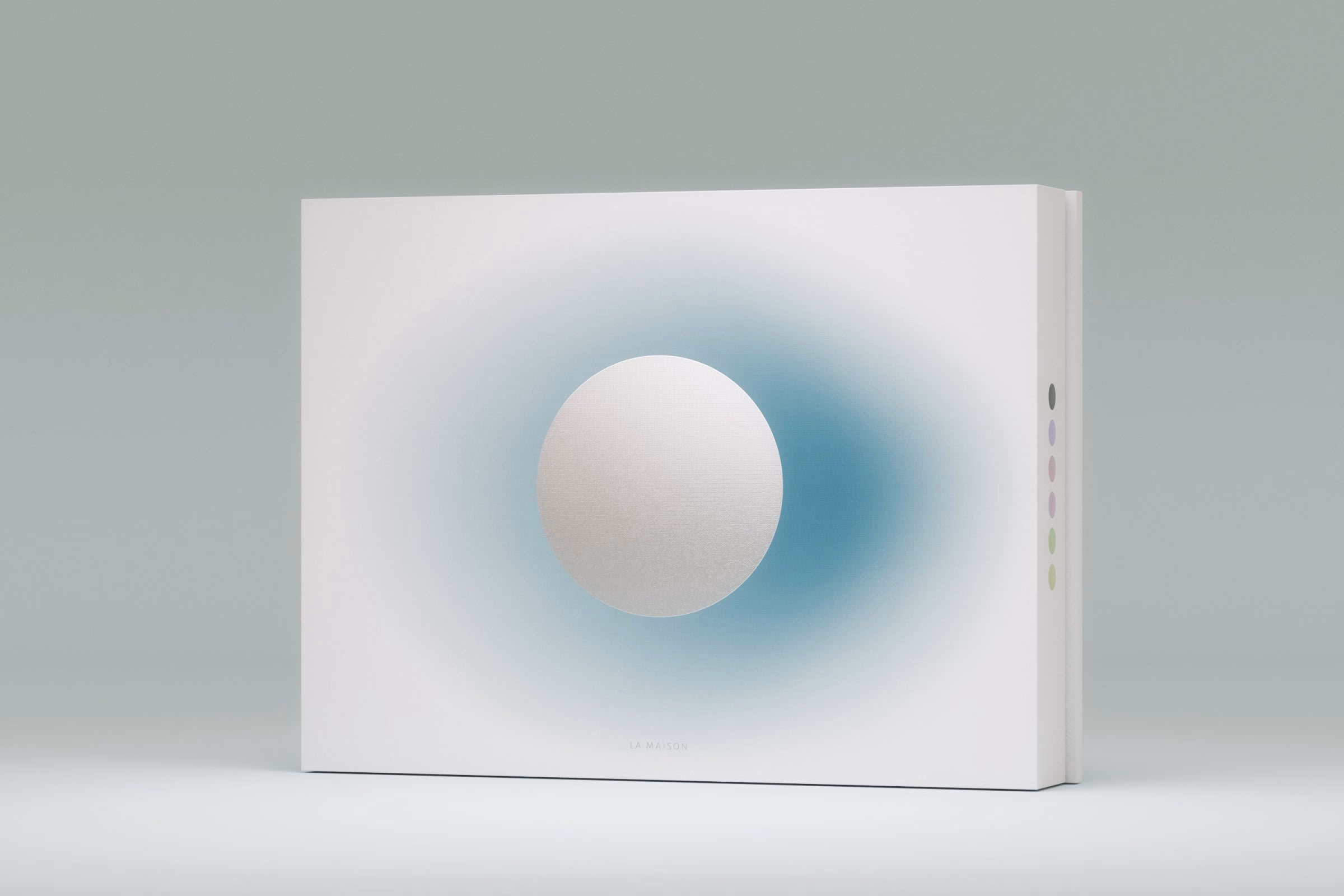 White LA MAISON mooncake box with an embossed foiled moon and blue halo, House of Ta Studio
