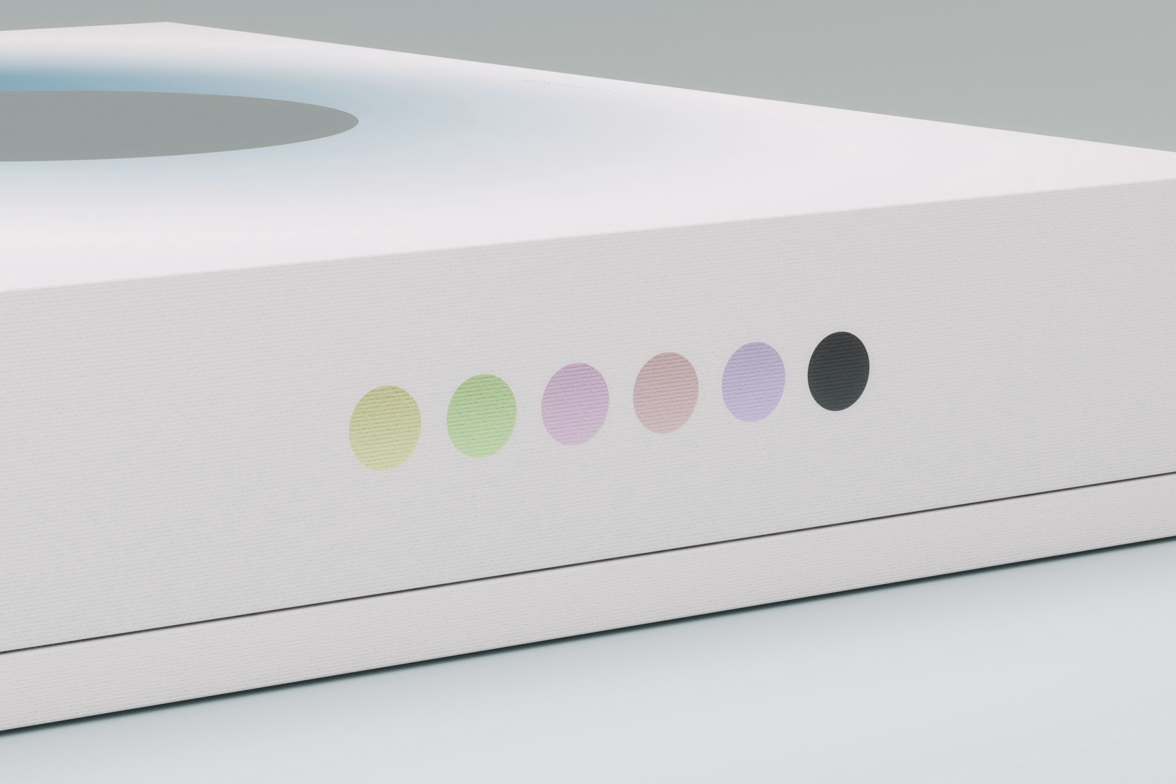 Row of six coloured flavour dots on a white mooncake box edge, LA MAISON packaging