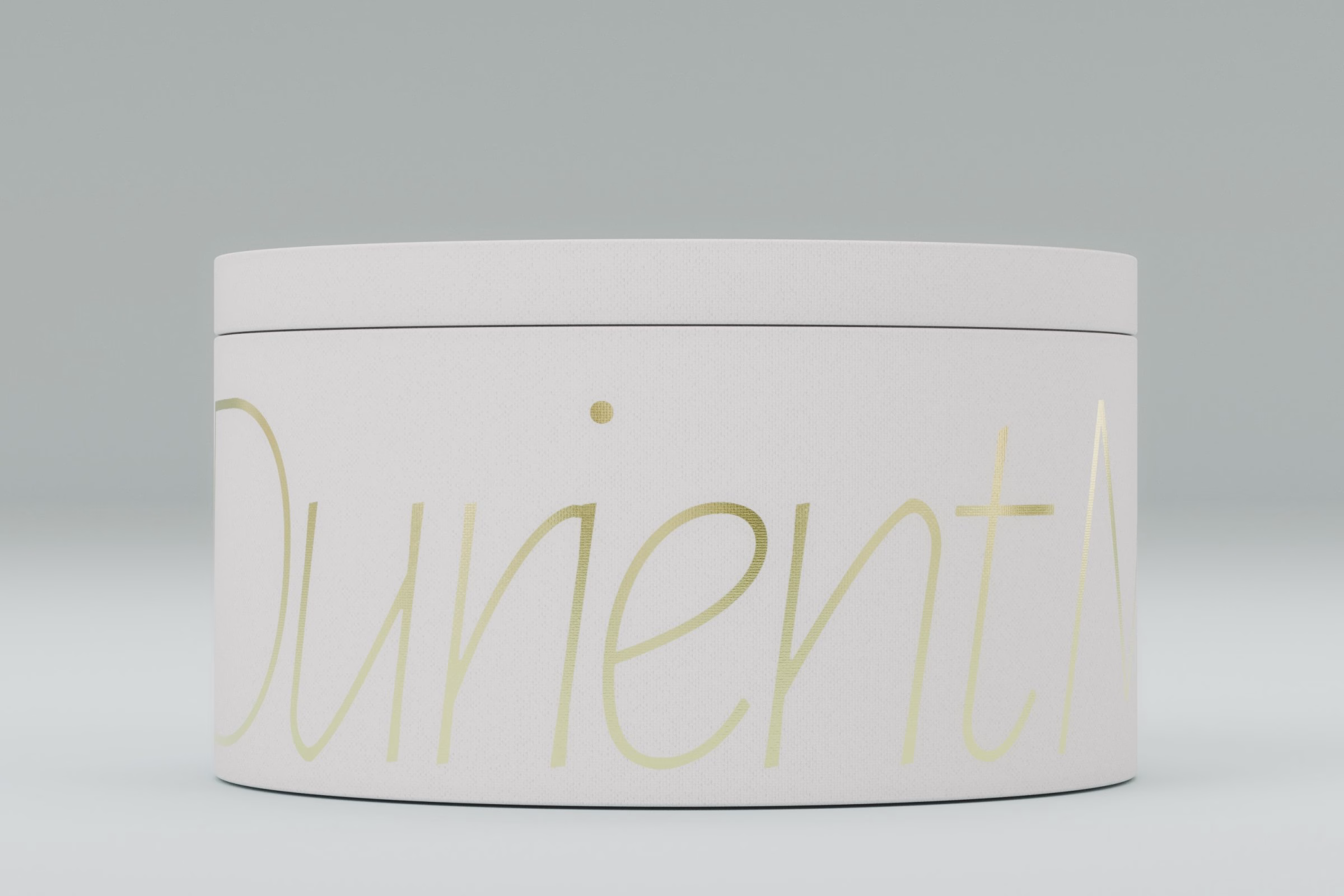 White tin with gold-toned script flavour lettering, LA MAISON vegan mooncake packaging