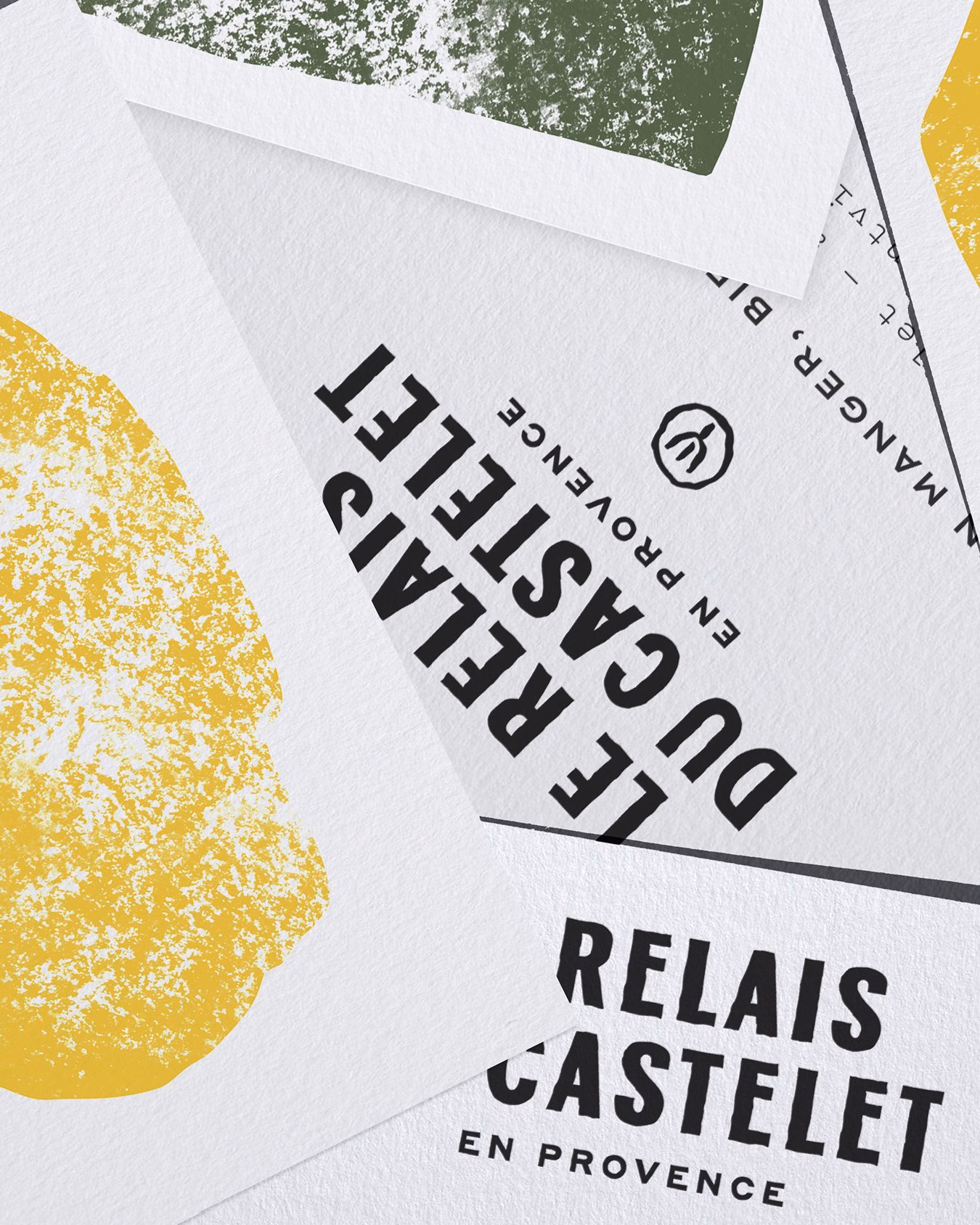 Collage of textured paper featuring a yellow fertility symbol and bold typography for Relais Castelet en Provence.